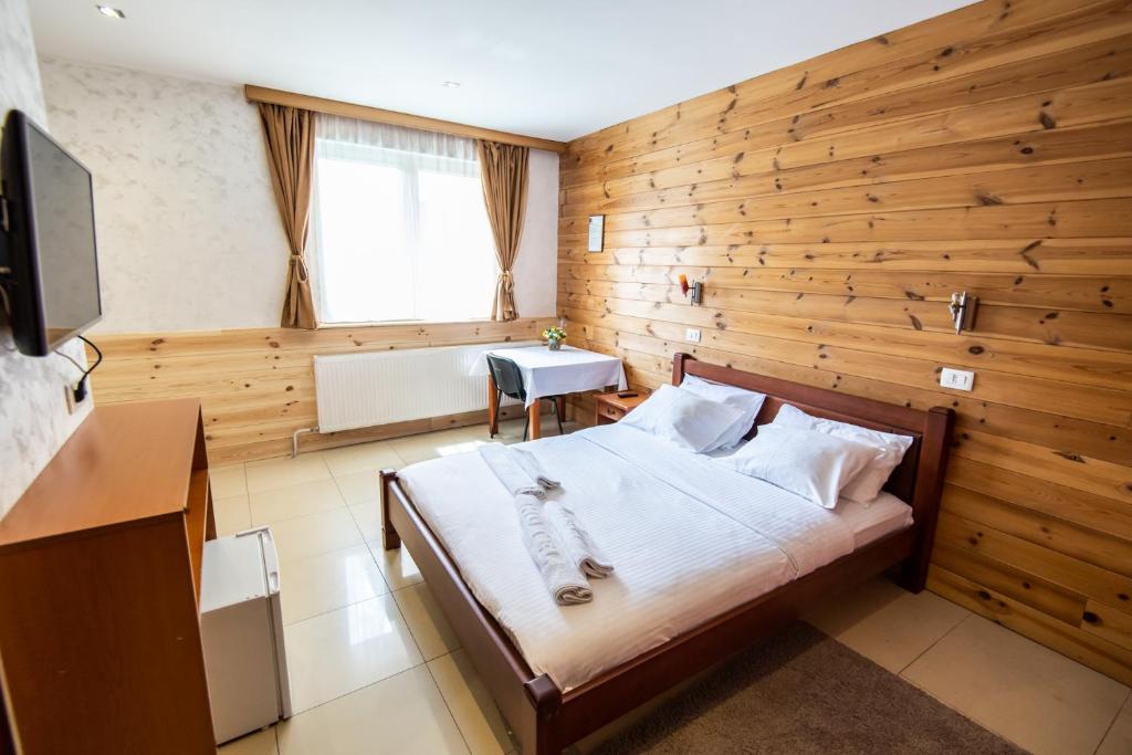 TV a/nebo společenská místnost v ubytování Hotel Enigma