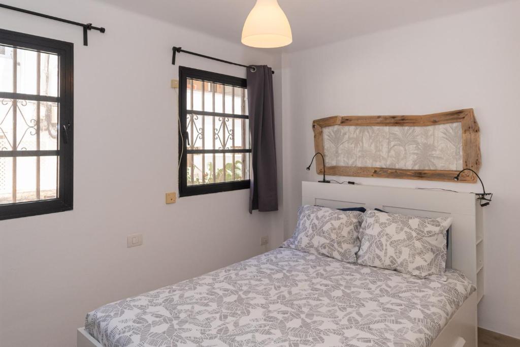 Postel nebo postele na pokoji v ubytování Maria Luisa