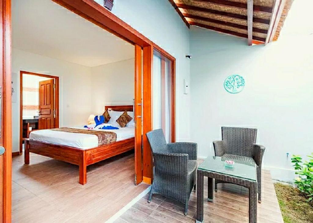 Hotel and Villa B52 Gili Air客房内的一张或多张床位