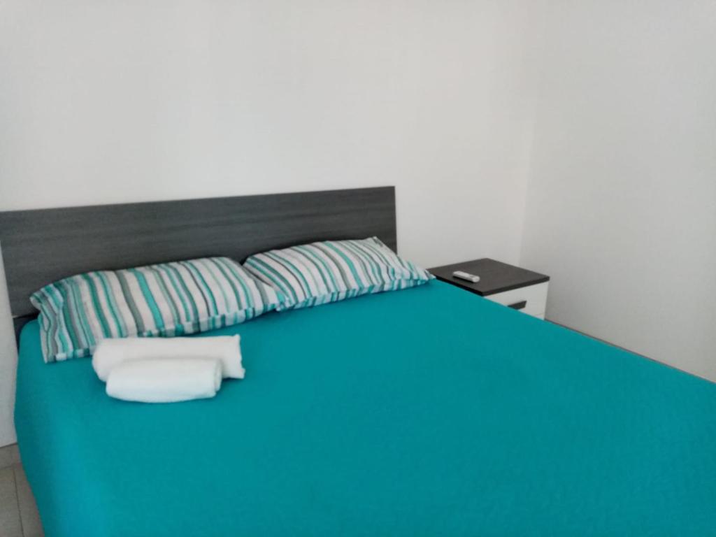 Postel nebo postele na pokoji v ubytování Andasì