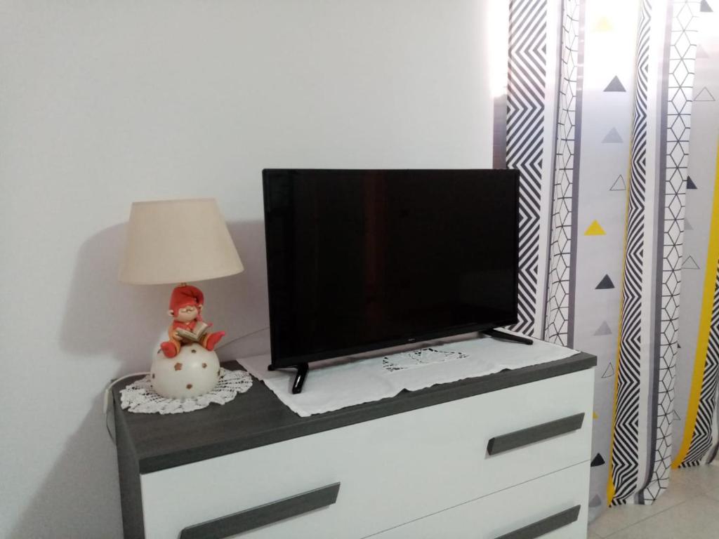 TV a/nebo společenská místnost v ubytování Andasì