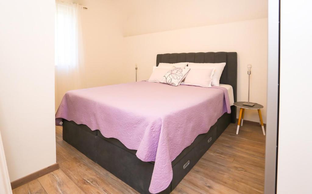Posteľ alebo postele v izbe v ubytovaní Apartment Dvor