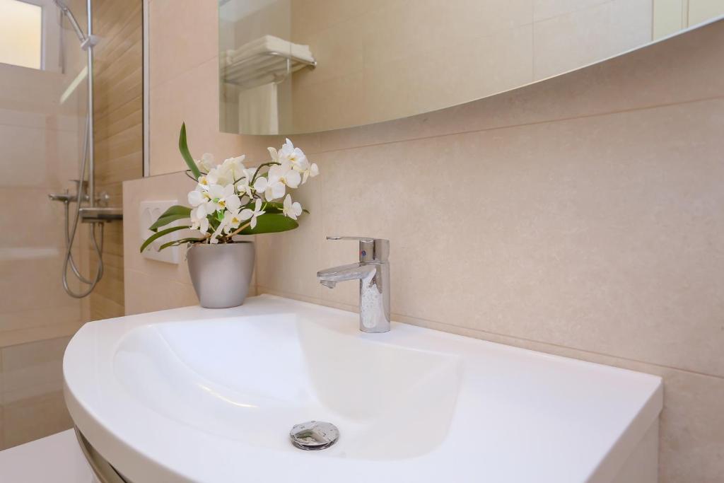 Kúpeľňa v ubytovaní Apartment Dvor