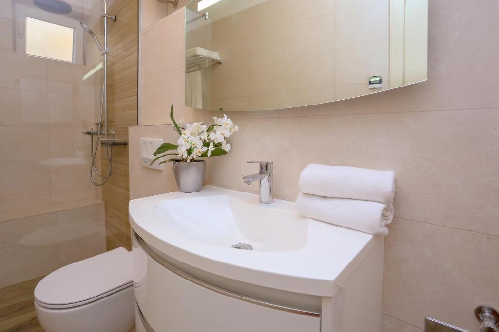 Kúpeľňa v ubytovaní Apartment Dvor