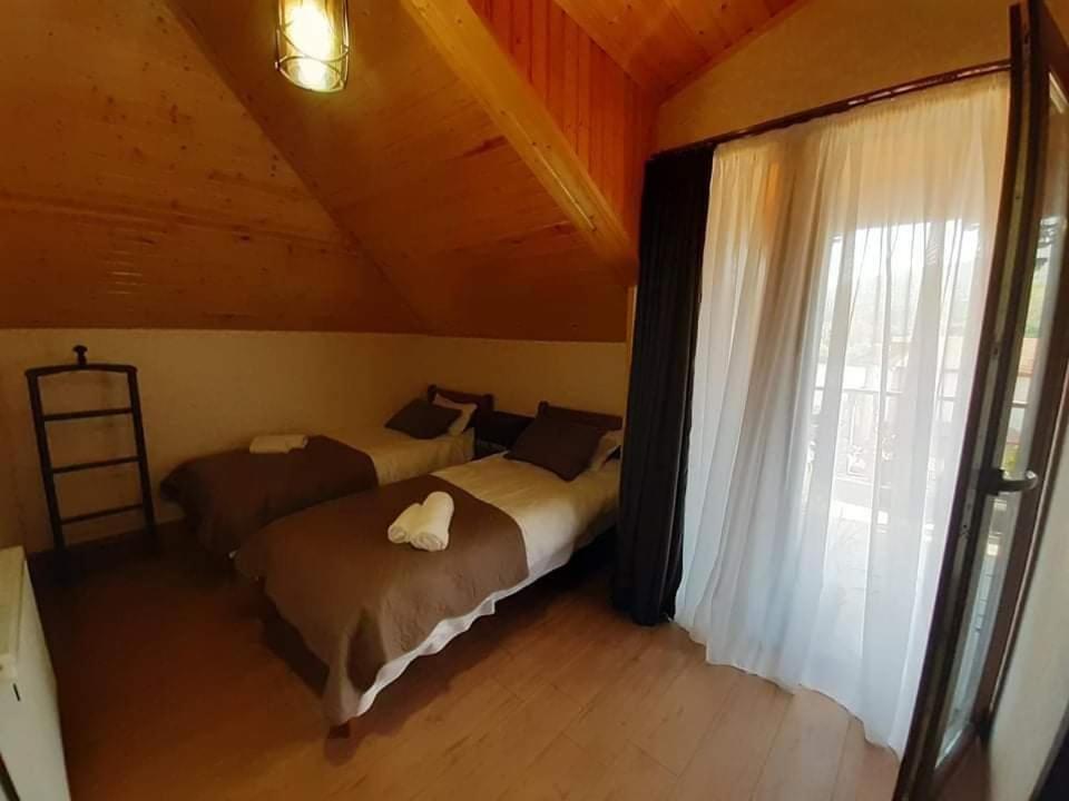 Postel nebo postele na pokoji v ubytování Davit batoni Guest house