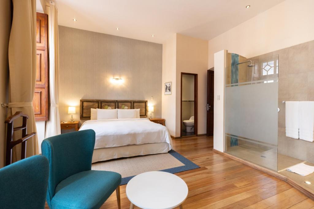 Postel nebo postele na pokoji v ubytování Casa El Edén