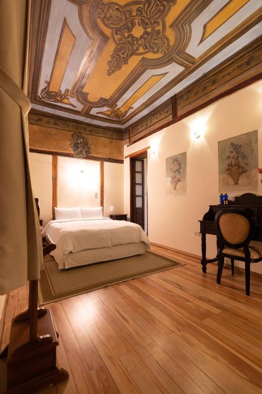 Postel nebo postele na pokoji v ubytování Casa El Edén