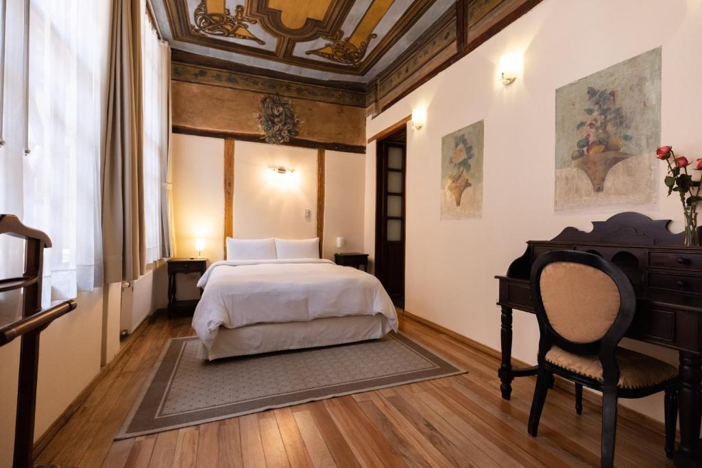 Postel nebo postele na pokoji v ubytování Casa El Edén