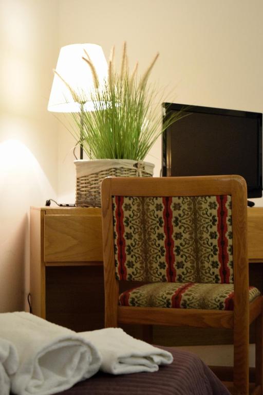TV a/nebo společenská místnost v ubytování Hotel Vajolet