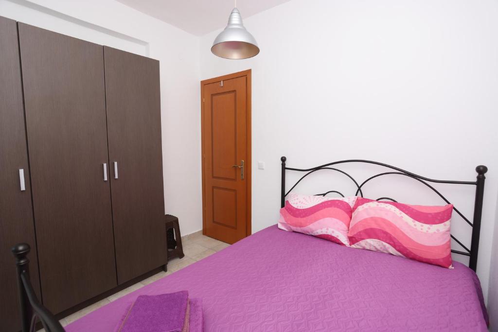 Posteľ alebo postele v izbe v ubytovaní Luxury Villas Polychrono