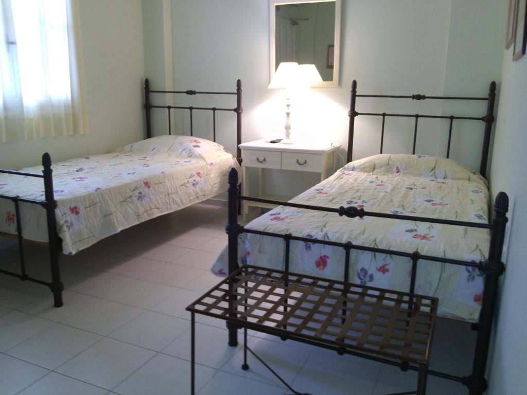 A bed or beds in a room at iliobasilema studios & apartments