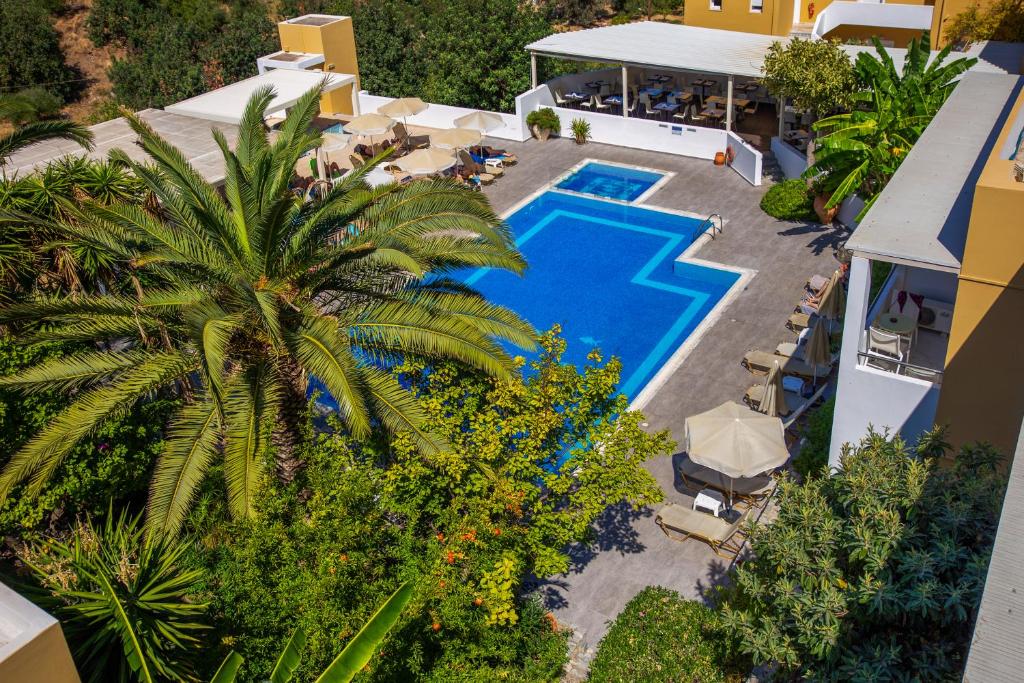 an aerial view of a swimming pool in a villa at Xidas Garden in Bali