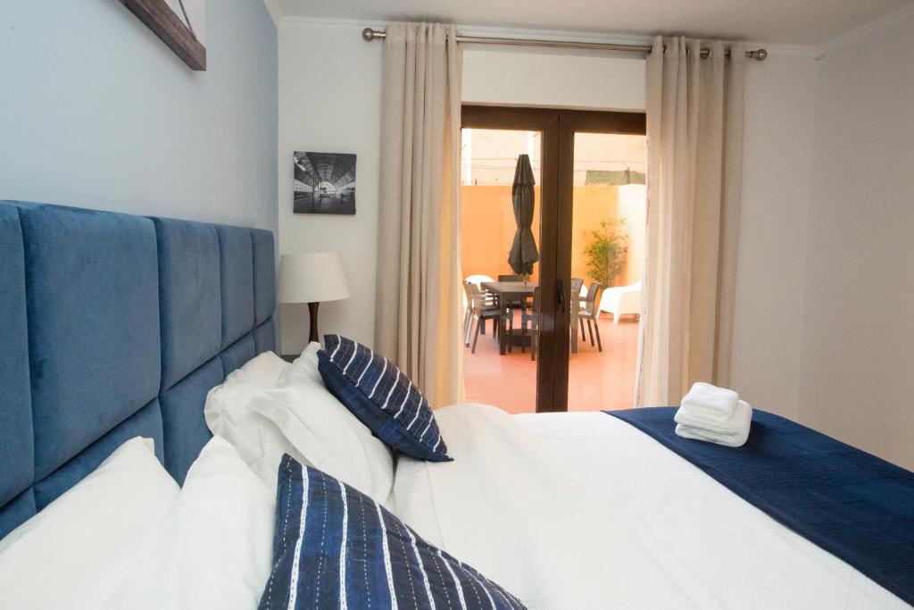 Ένα ή περισσότερα κρεβάτια σε δωμάτιο στο Meriteluna Pateo