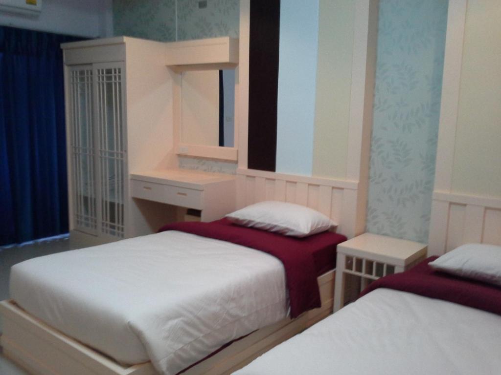 Postel nebo postele na pokoji v ubytování Tokyo Country Inn