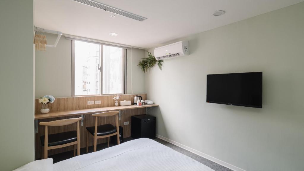 TV a/nebo společenská místnost v ubytování Hotel attic