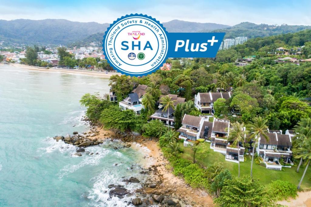 an aerial view of a resort with the shka plus sign at Kamala Beach Estate Apartment - SHA PLUS in Kamala Beach