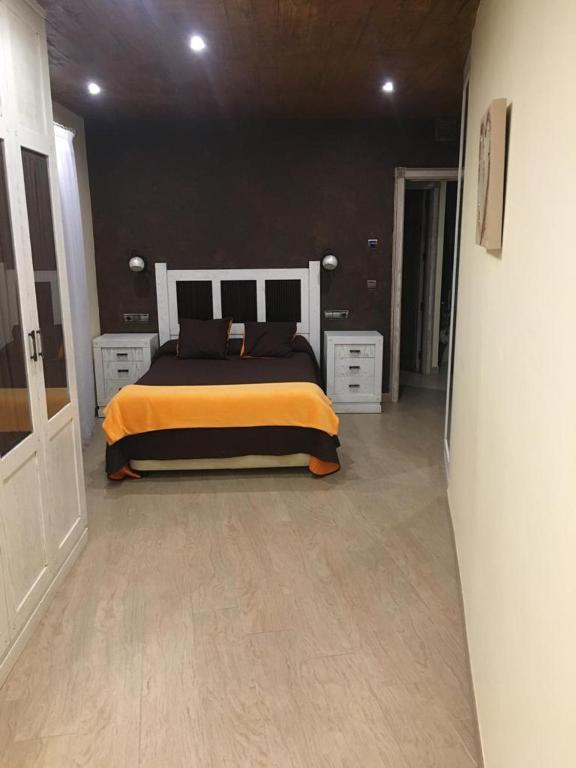 Cama o camas de una habitación en Hostal Mulhacen