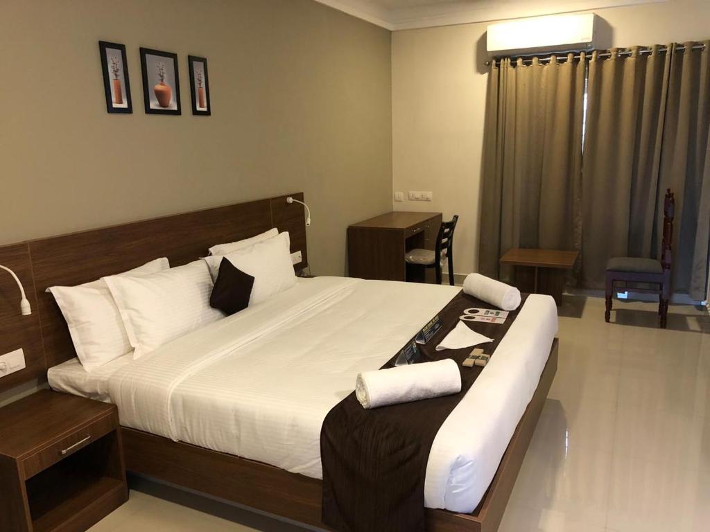 Postel nebo postele na pokoji v ubytování Hotel Mayo