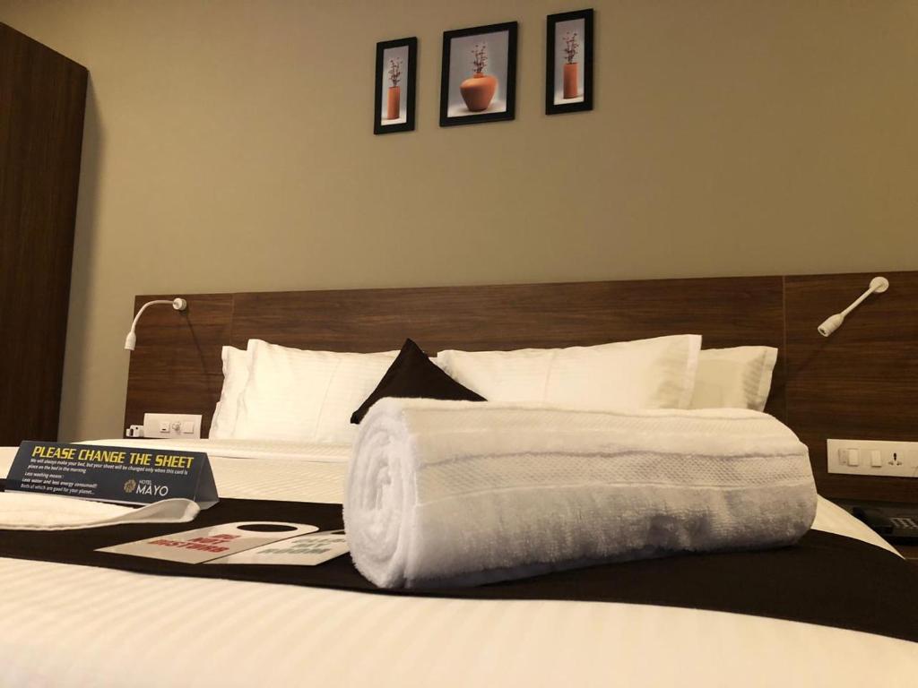 Postel nebo postele na pokoji v ubytování Hotel Mayo