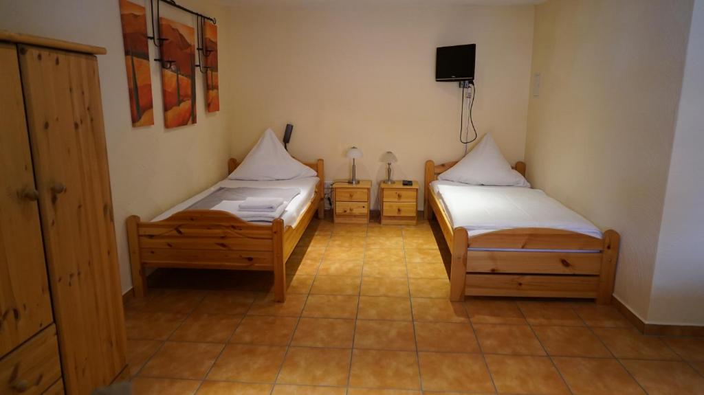 Posteľ alebo postele v izbe v ubytovaní Hotel Landhaus Greene