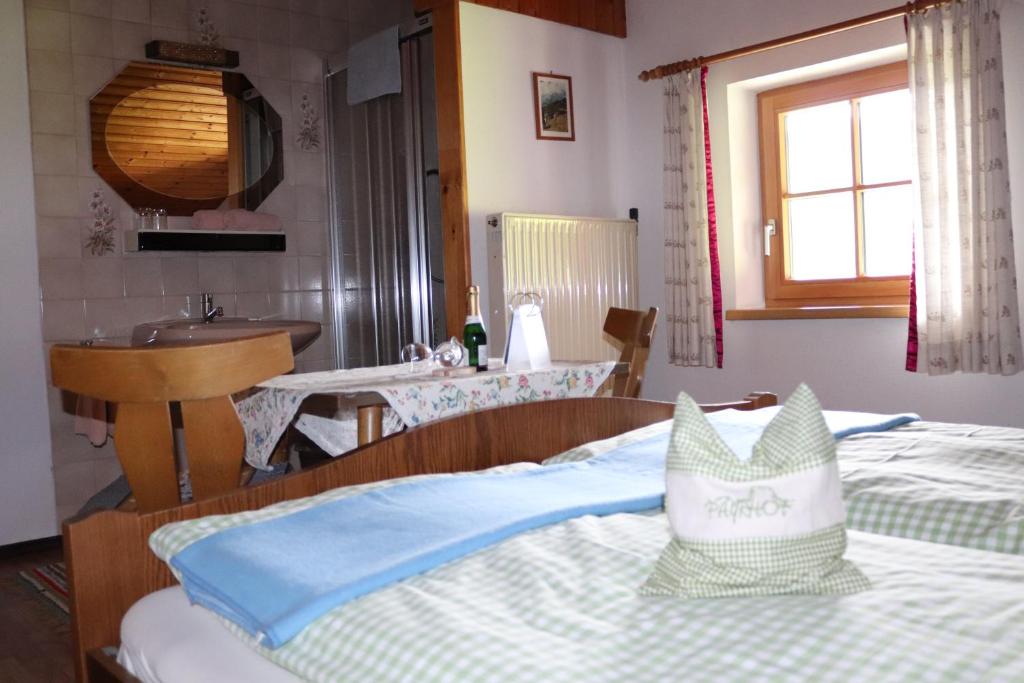 Postel nebo postele na pokoji v ubytování Payrhof