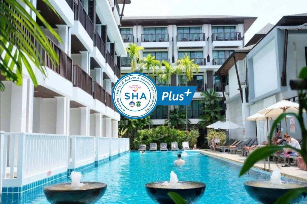 a swimming pool at the shka phu resort and spa at Apasari Krabi - SHA Extra Plus in Ao Nang Beach