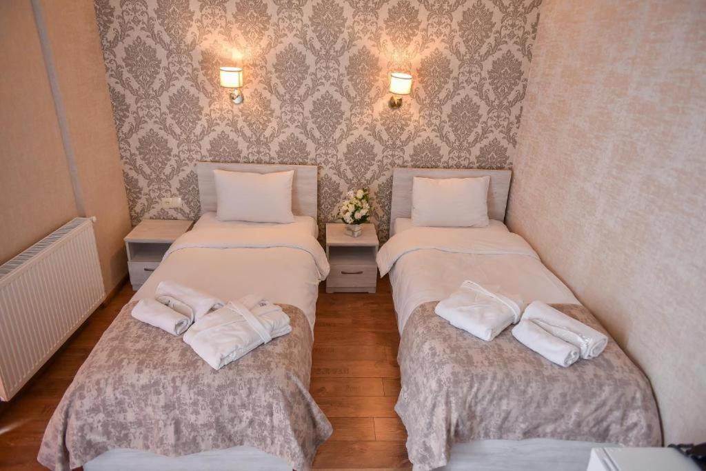 Postel nebo postele na pokoji v ubytování MariaLuis Hotel