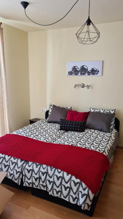 Posteľ alebo postele v izbe v ubytovaní Lucsony Apartman