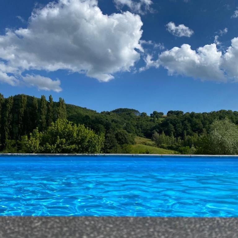 Bazén v ubytování B&B VILLA GINEVRA nebo v jeho okolí