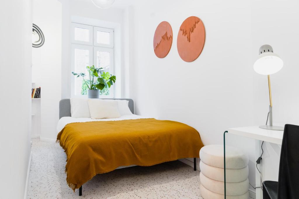 Posteľ alebo postele v izbe v ubytovaní Warsaw Concierge Koneser