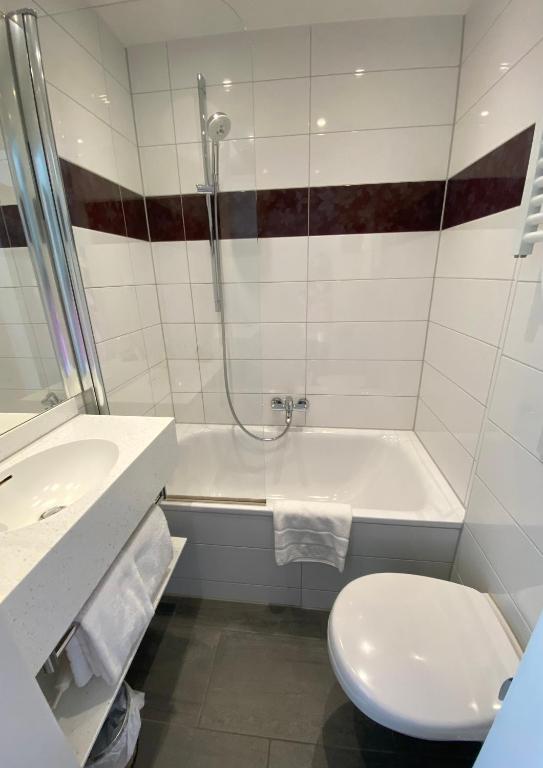 Koupelna v ubytování Hotel Condor