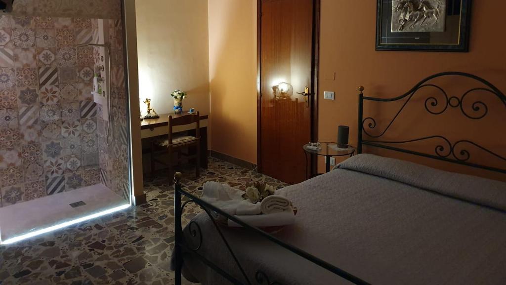 Magie al tramonto B&B - Viervoudige Kamer Met Eigen Badkamer