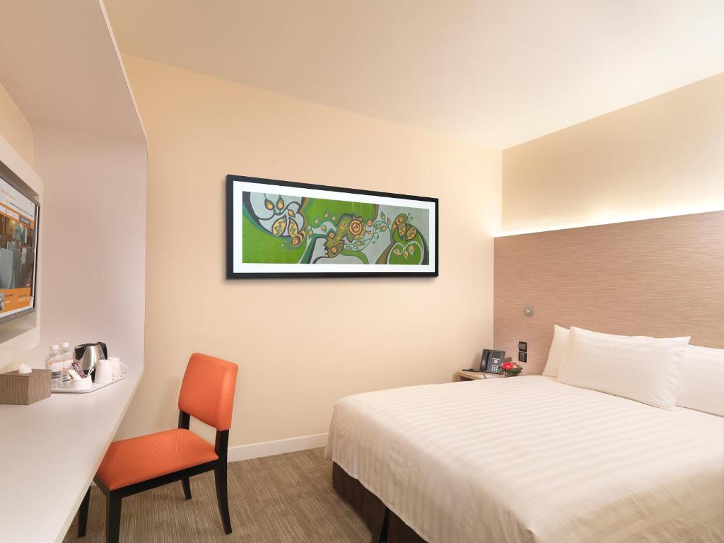 Postel nebo postele na pokoji v ubytování Sama-Sama Express KLIA Terminal 2 - Airside Transit Hotel