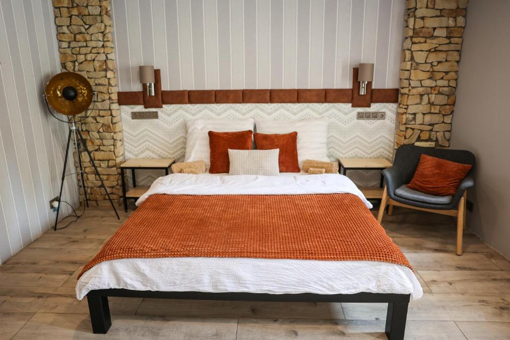 Posteľ alebo postele v izbe v ubytovaní Kis Veréb Vendégház