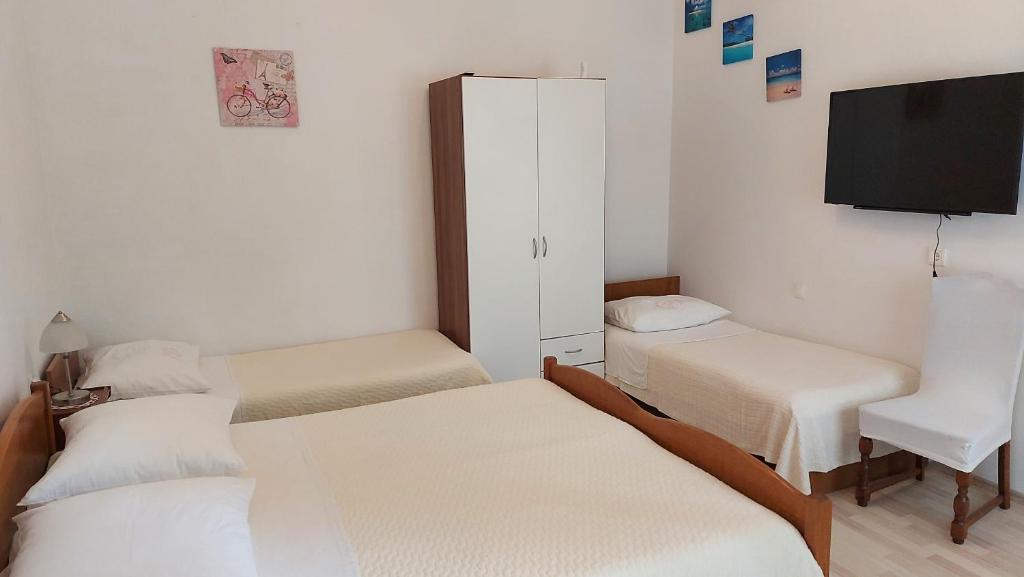 Posteľ alebo postele v izbe v ubytovaní Apartment Jerolima