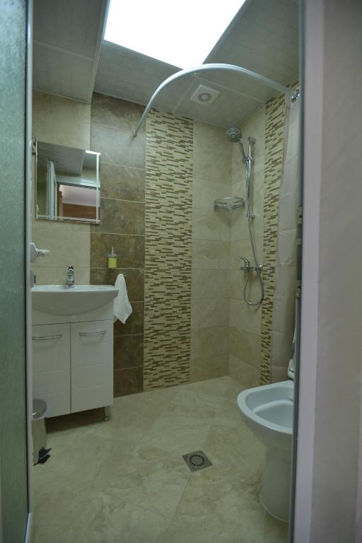 Koupelna v ubytování Guest House ERIDA