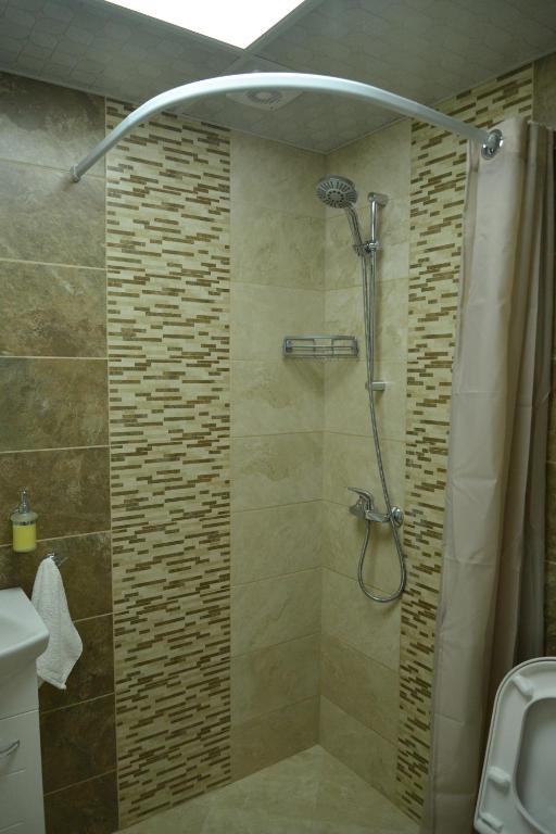 Koupelna v ubytování Guest House ERIDA