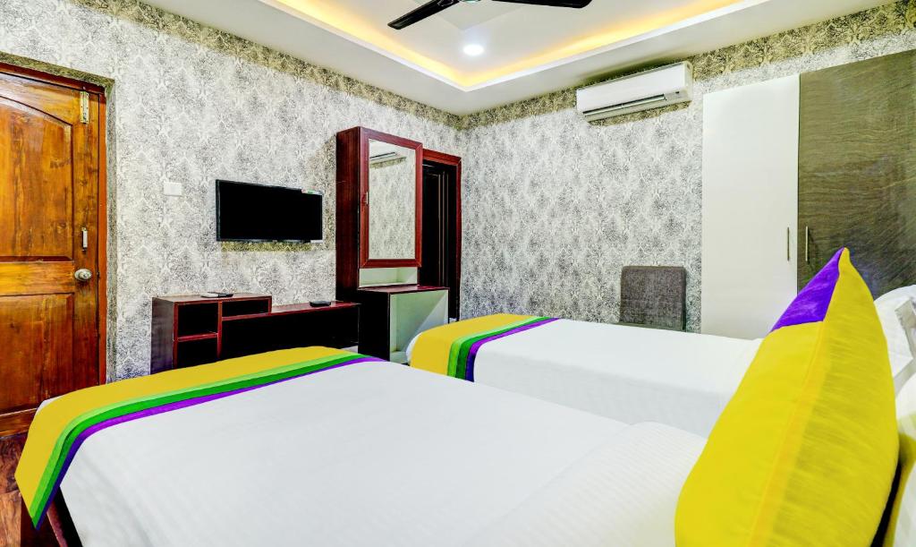 TV a/nebo společenská místnost v ubytování Itsy Hotels Aasma Luxury Villa