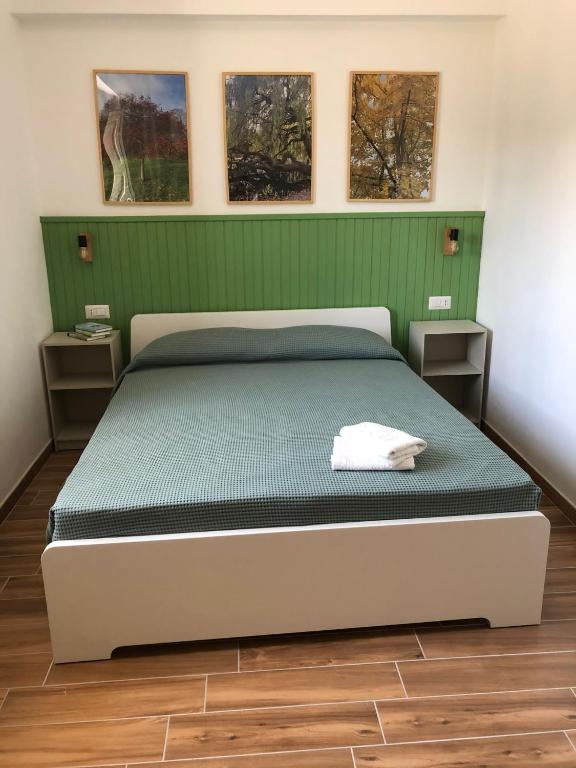 Postel nebo postele na pokoji v ubytování Ai Cerri di Remí