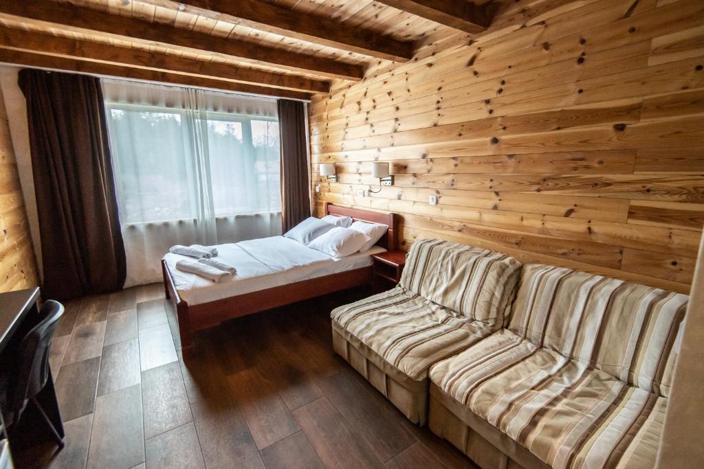 Postel nebo postele na pokoji v ubytování Hotel Enigma