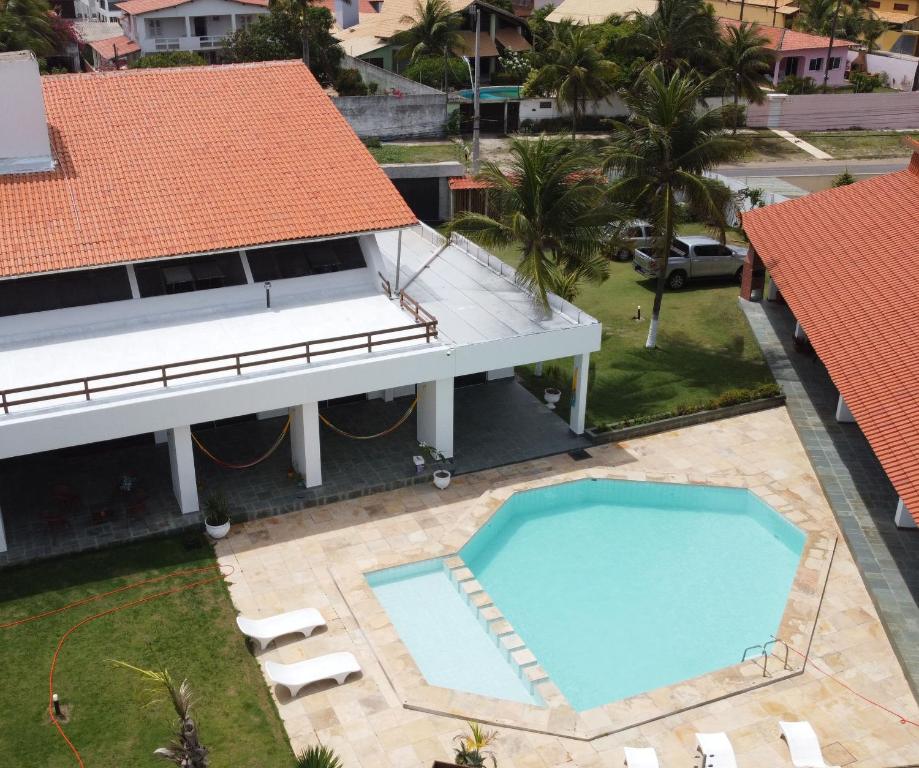 an aerial view of a resort with a swimming pool at Pousada Kite Da Mary Cumbuco in Cumbuco