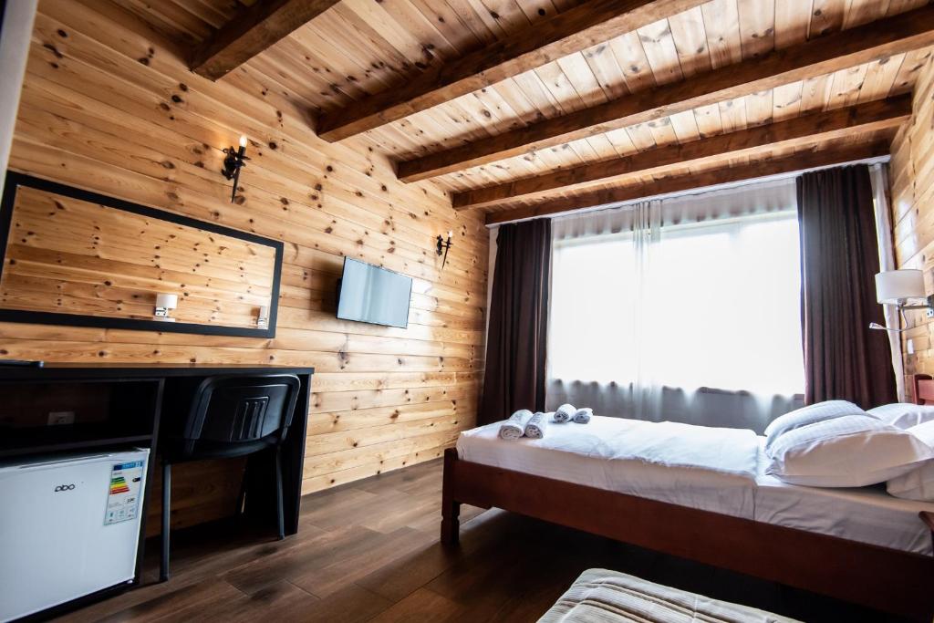 Postel nebo postele na pokoji v ubytování Hotel Enigma