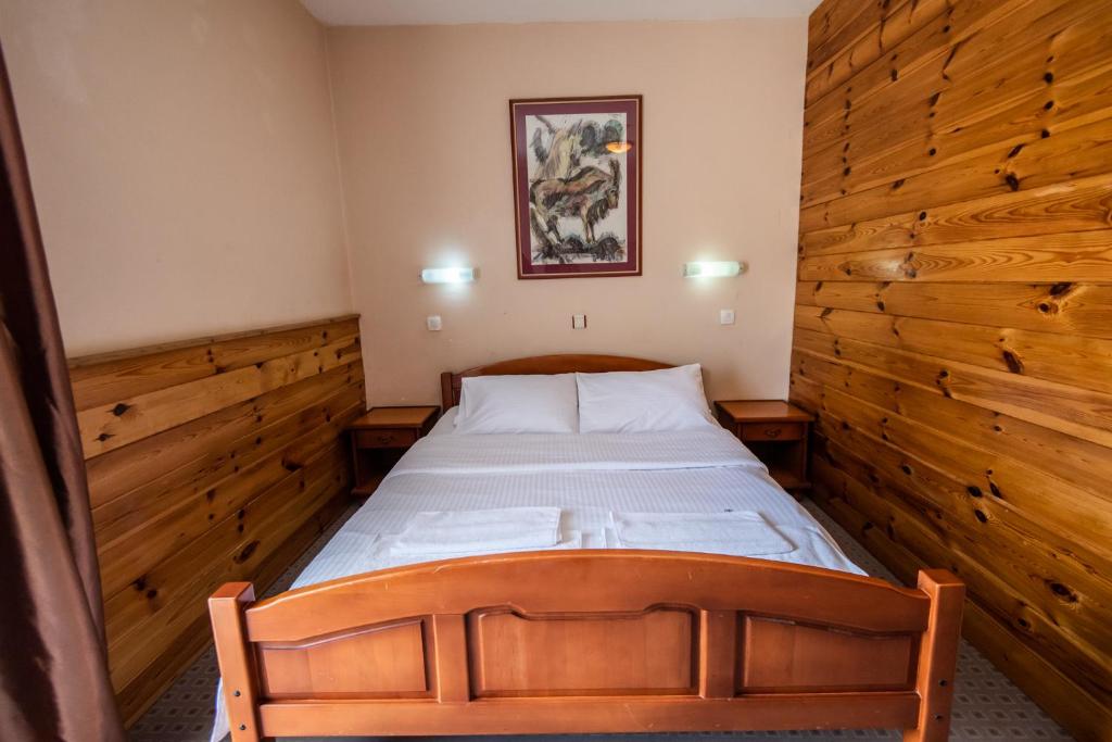 Postel nebo postele na pokoji v ubytování Hotel Enigma