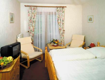 Postel nebo postele na pokoji v ubytování Hostel zum Löwen