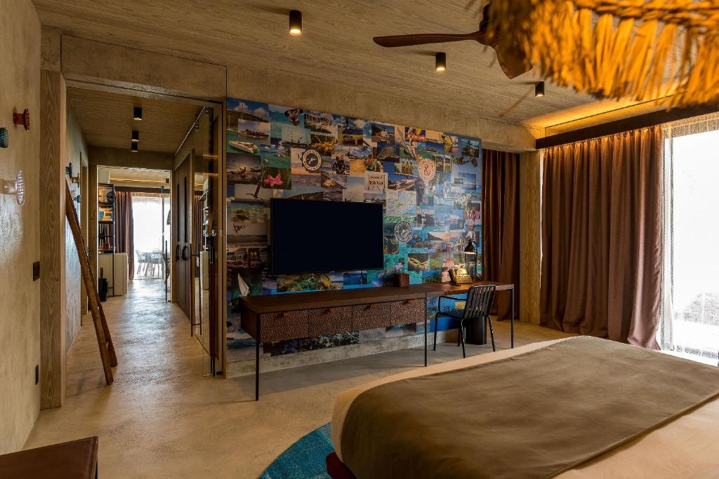TV a/nebo společenská místnost v ubytování Saba Rock Resort