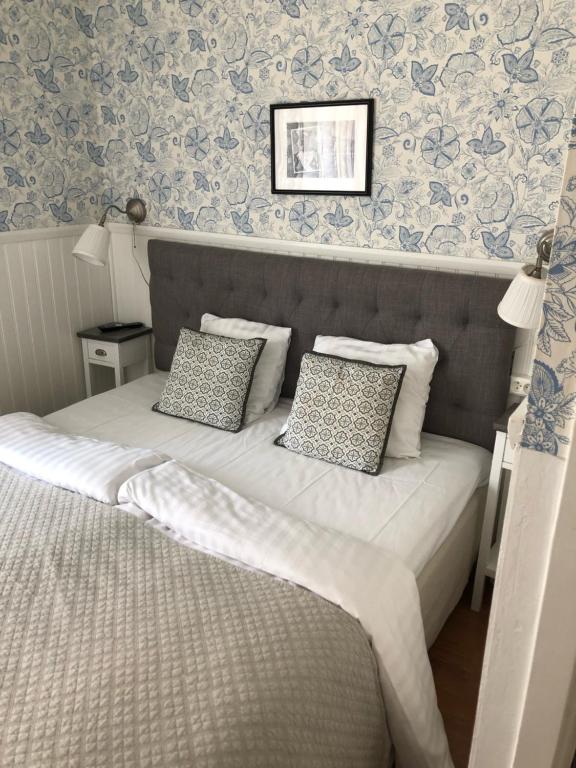 Voodi või voodid majutusasutuse Nautic Hotell toas