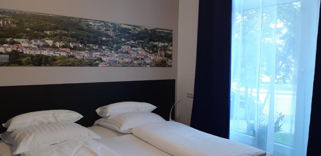 Postel nebo postele na pokoji v ubytování Mar Hotel