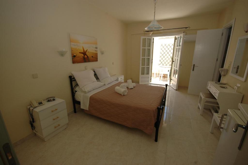 Postel nebo postele na pokoji v ubytování Pension Ocean View