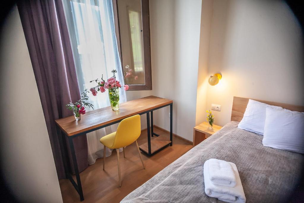 Postel nebo postele na pokoji v ubytování Latour Mestia