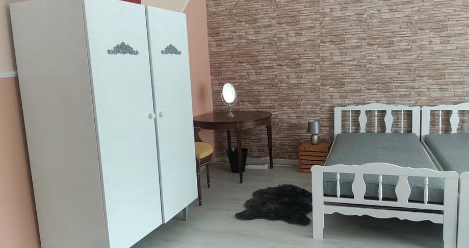 Postel nebo postele na pokoji v ubytování Dancz Home